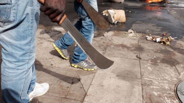 cult attacks, police arrest 14