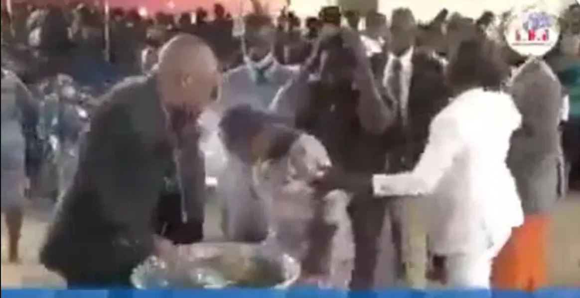 deliverance by scooping water into his mouth and spitting it on his members