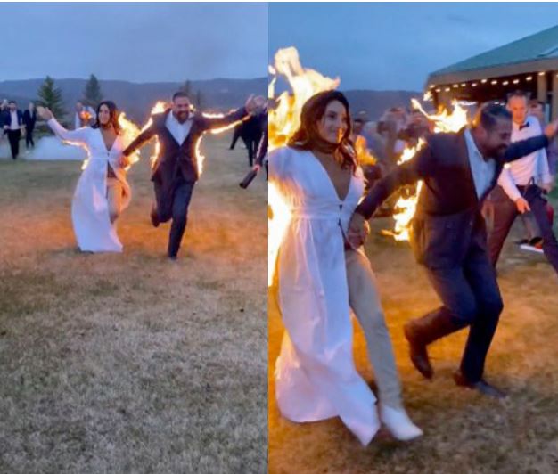 Bride and groom set themselves on fire during wedding send off