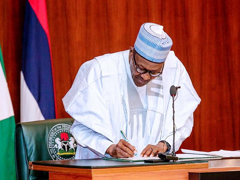 Buhari signs bills on electoral act, money laundering, terrorism, others