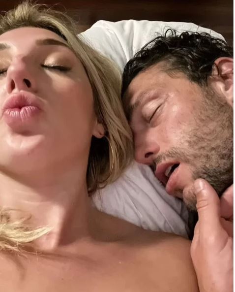 Woman pictured in bed with footballer Andy Carroll two weeks to his wedding