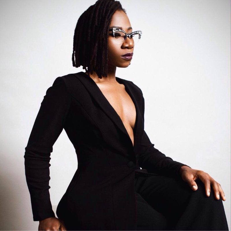 Asa performs 'Fire on the Mountain' at the relaunch of NNPC in front of President Buhari and other dignitaries (video)