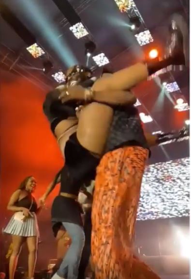 Dancer falls while trying to jump on Adekunle Gold’s body