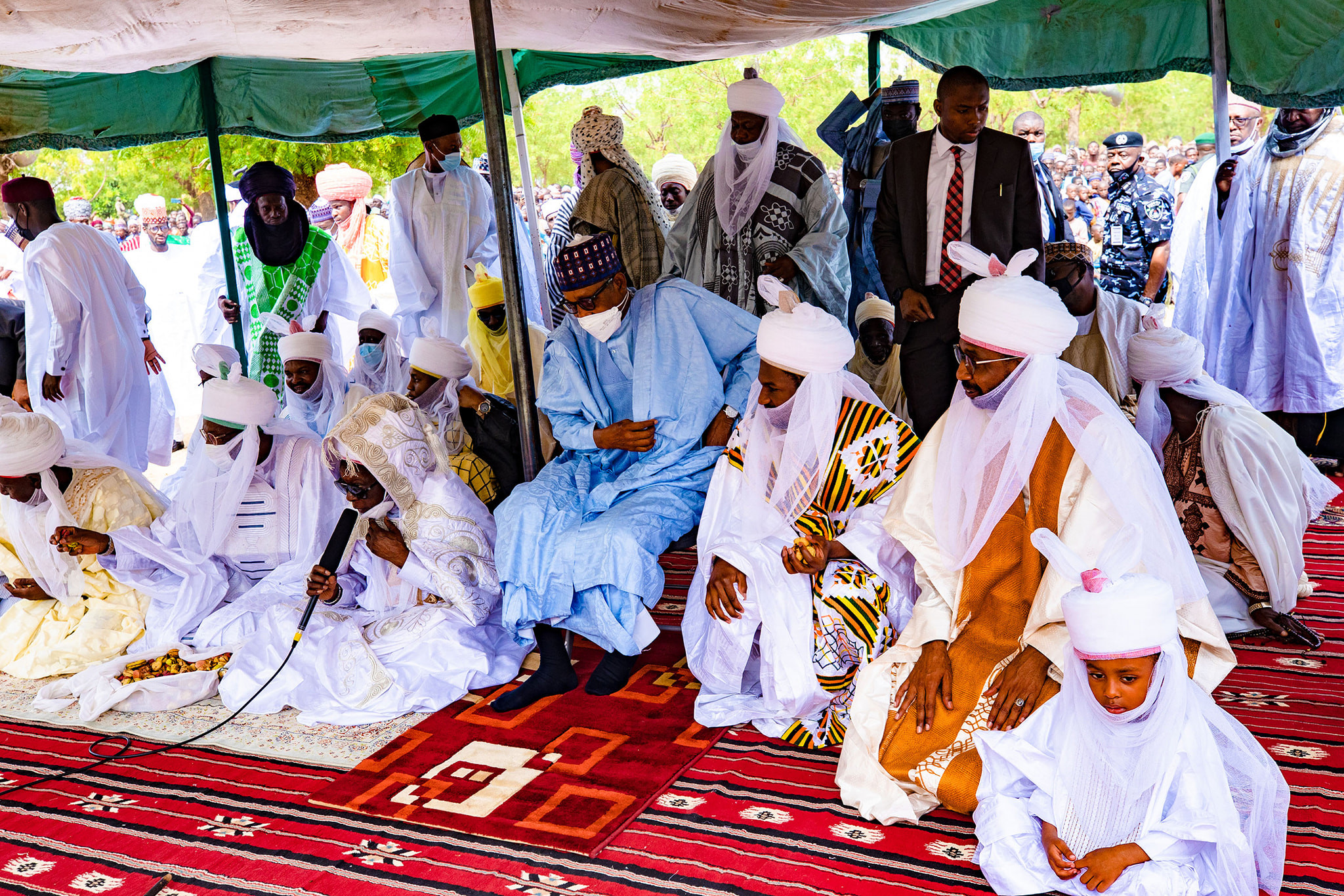 Photos of President Buhari and his son, Yusuf, at the Eid prayer ground in Daura