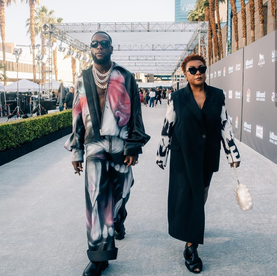 Bose Ogulu has told her son Burna Boy to "tone down the madness" as she celebrated his birthday. The African Giant turns 31 today, July 2, and his mother shared videos of him receiving a cake while performing on stage. She wrote in the caption: "Happy Birthday D. "You have given me so many reasons to be proud of the man you have become. "Let us tone down the madness. Cheers to a new age." "Let us tone down the madness" Burna Boy