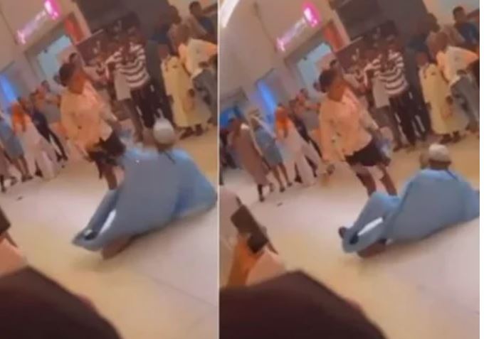 Man falls to the ground after being slapped by girlfriend he proposed to at an Ibadan mall (video)