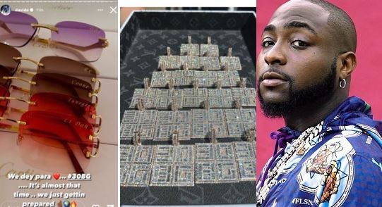 Singer Davido gifts his entire crew ''30BG'' diamond-studded pendants and Cartier glasses with their initials on it (video/photos)