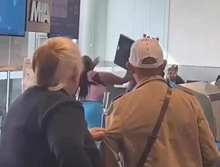 Woman throws computer at airline agent at Miami airport (video)