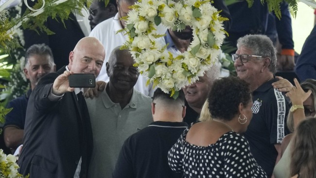 FIFA president Gianni Infantino hits back at critics after taking selfie at Pele’s wake-keep